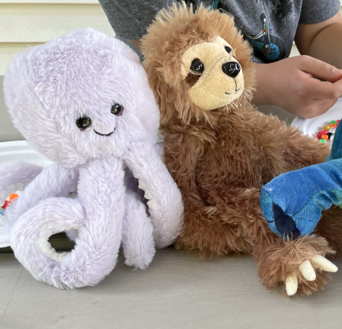 Cute stuffed octopus and sloth toys