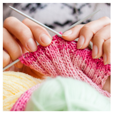 a pair of hands knitting