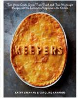 a golden baked pie with the word Keepers spelled out in dough on top